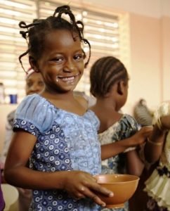 Photo 3: One of the nursery school’s princesses, with a milk moustache still over her smile
